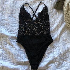 Backless, black lace onesie